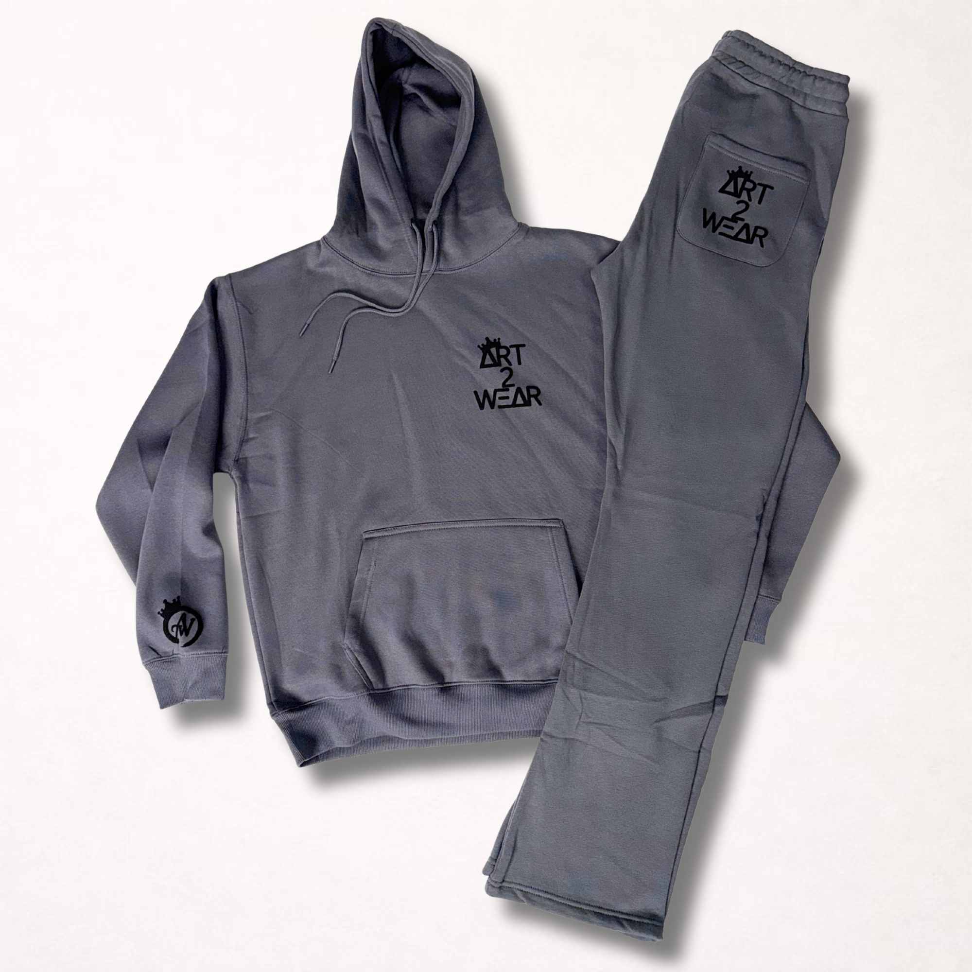 Dark gray sweatsuit set with black badge logo hoodie and matching sweatpants, Art to Wear streetwear set