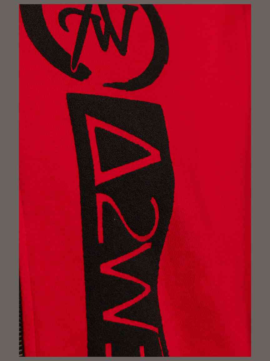 Black logo on a red background